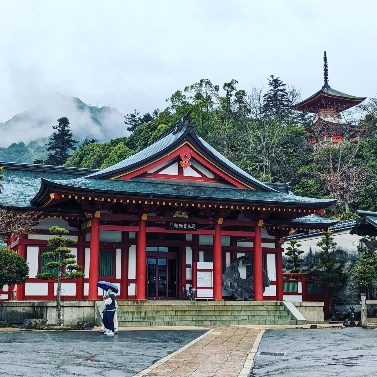 Fog covered Japanese forest shrine